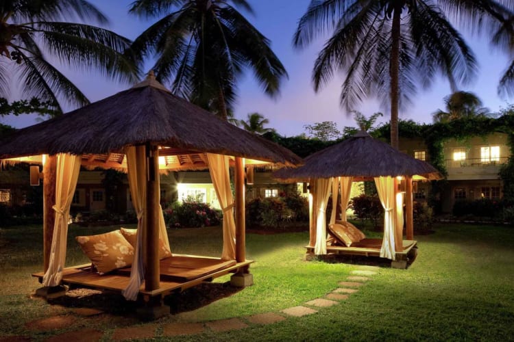 Garden cabanas in evening